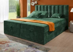 Boxspringbett mit individueller Kopfteilverstellung und Deko-Kissen