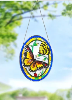 Glasbild mit Metallrahmen und Metallkette