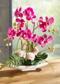 Orchideen-Arrangement in Schale