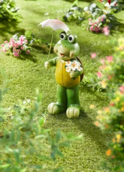 Schildkröte mit Solar-Blume und Regenschirm